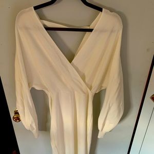 White sweater dress. V front and back with batwing sleeves. Worn 1x, cleaned.